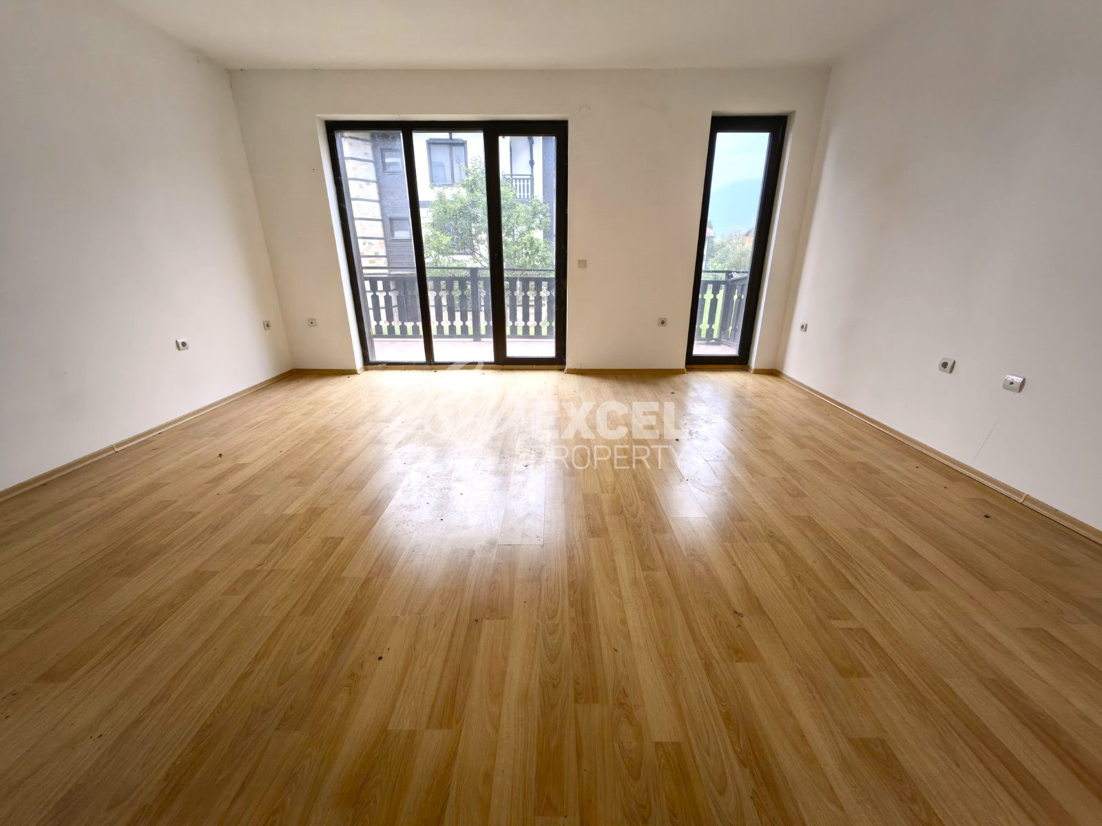 Spacious south facing studio for sale in year-round complex with low maintenance fee