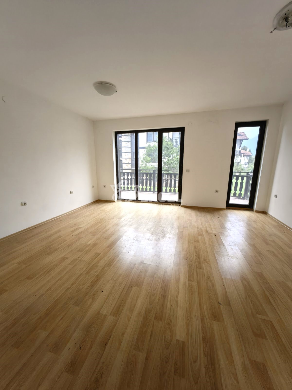 Spacious south facing studio for sale in year-round complex with low maintenance fee