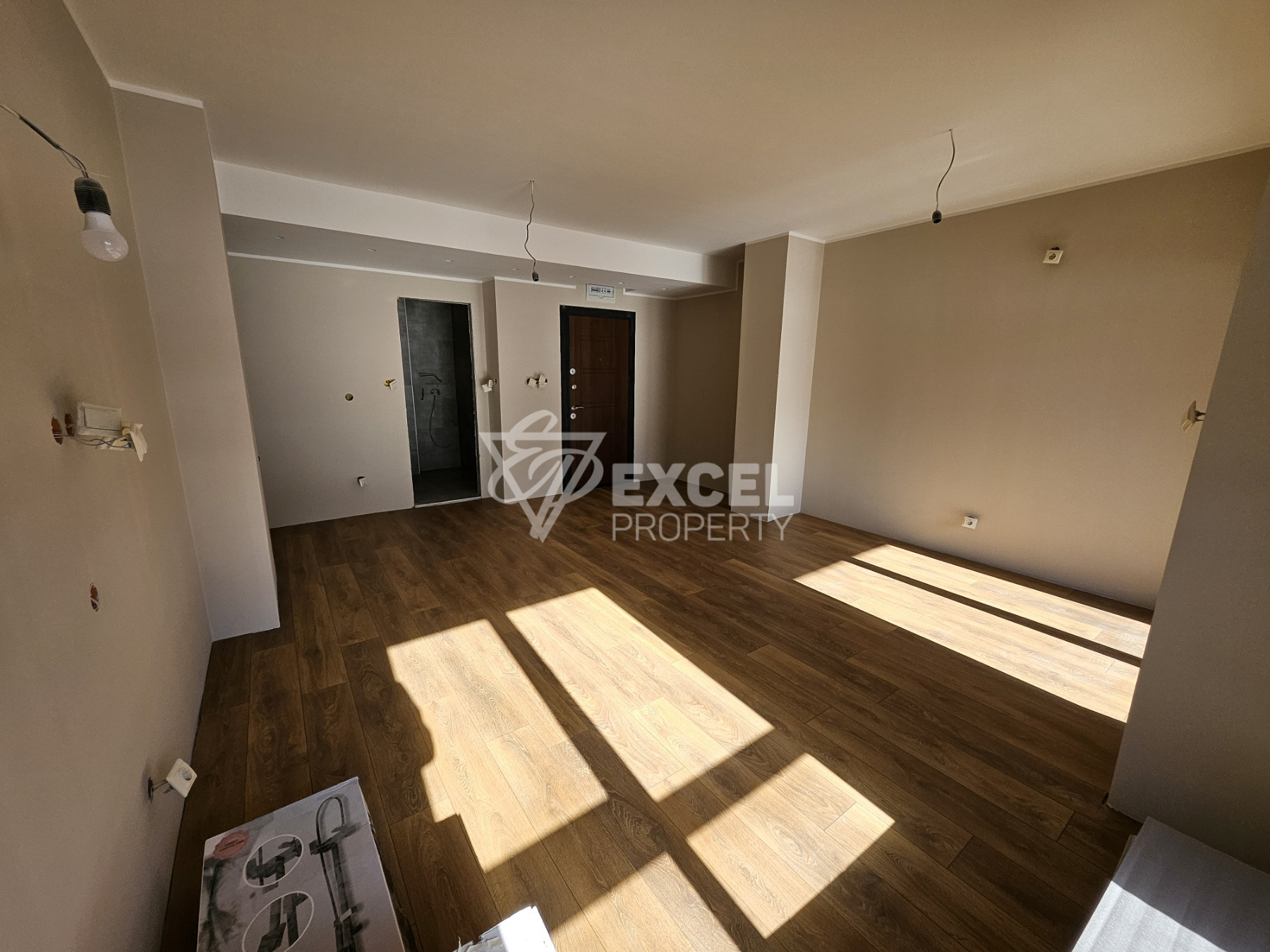 Spacious southern studio for sale in a residential building with low maintenance fees, Bansko
