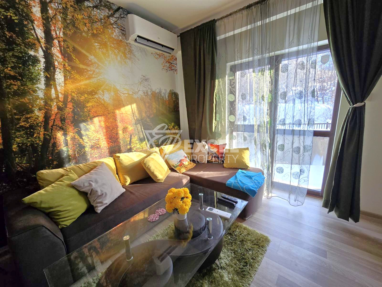 One-bedroom apartment with south exposure and low maintenance fee for sale in Bansko