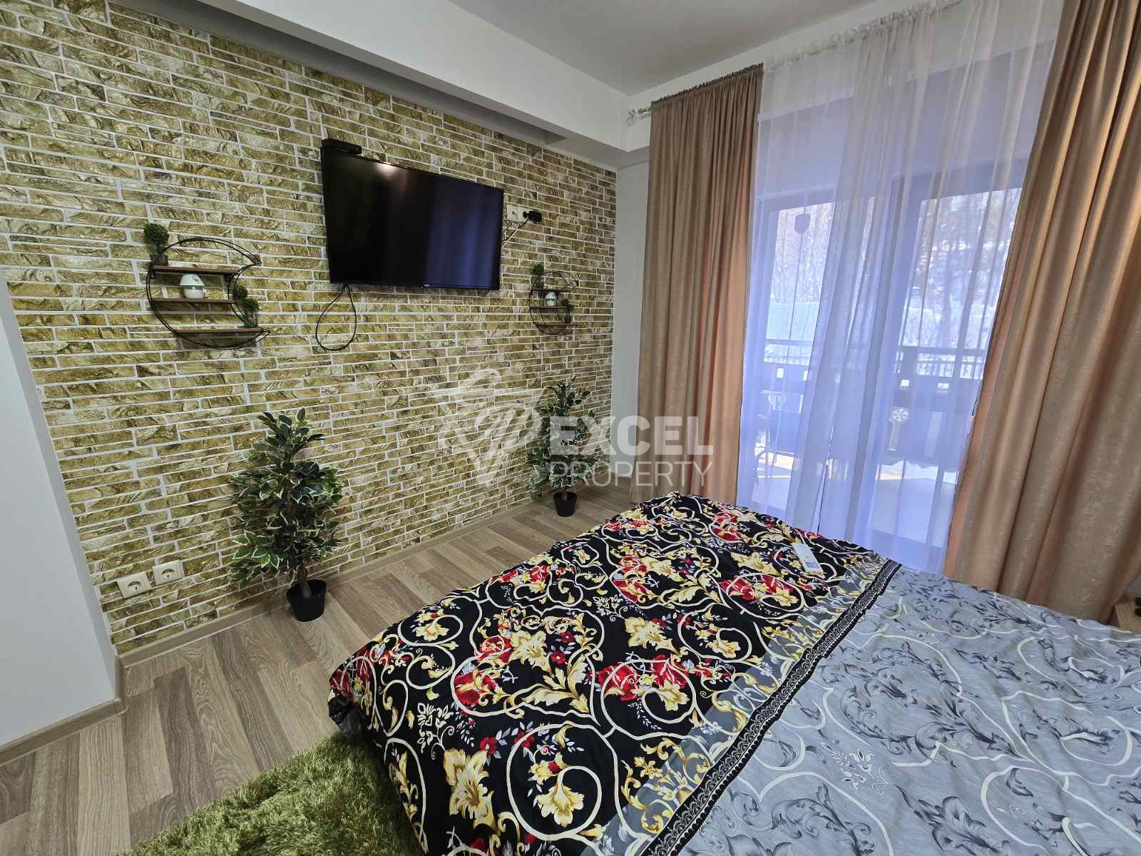 One-bedroom apartment with south exposure and low maintenance fee for sale in Bansko