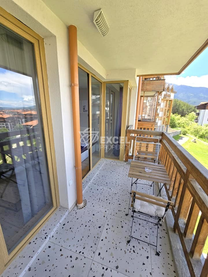 Modern one-bedroom apartment with fireplace in a low-maintenance residential building