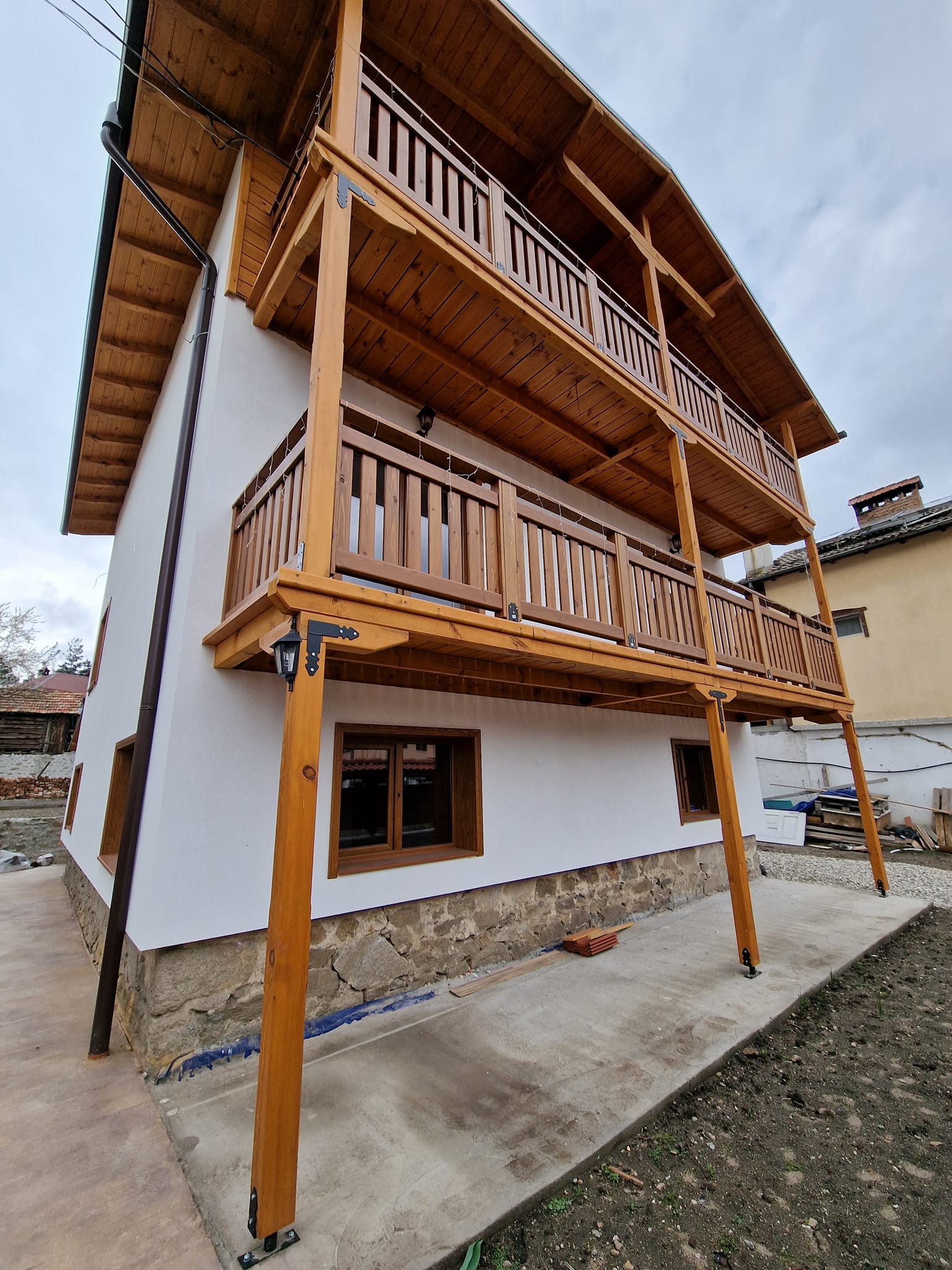 Renovated three-story house with a large yard for sale in the village of Banya, Bansko region