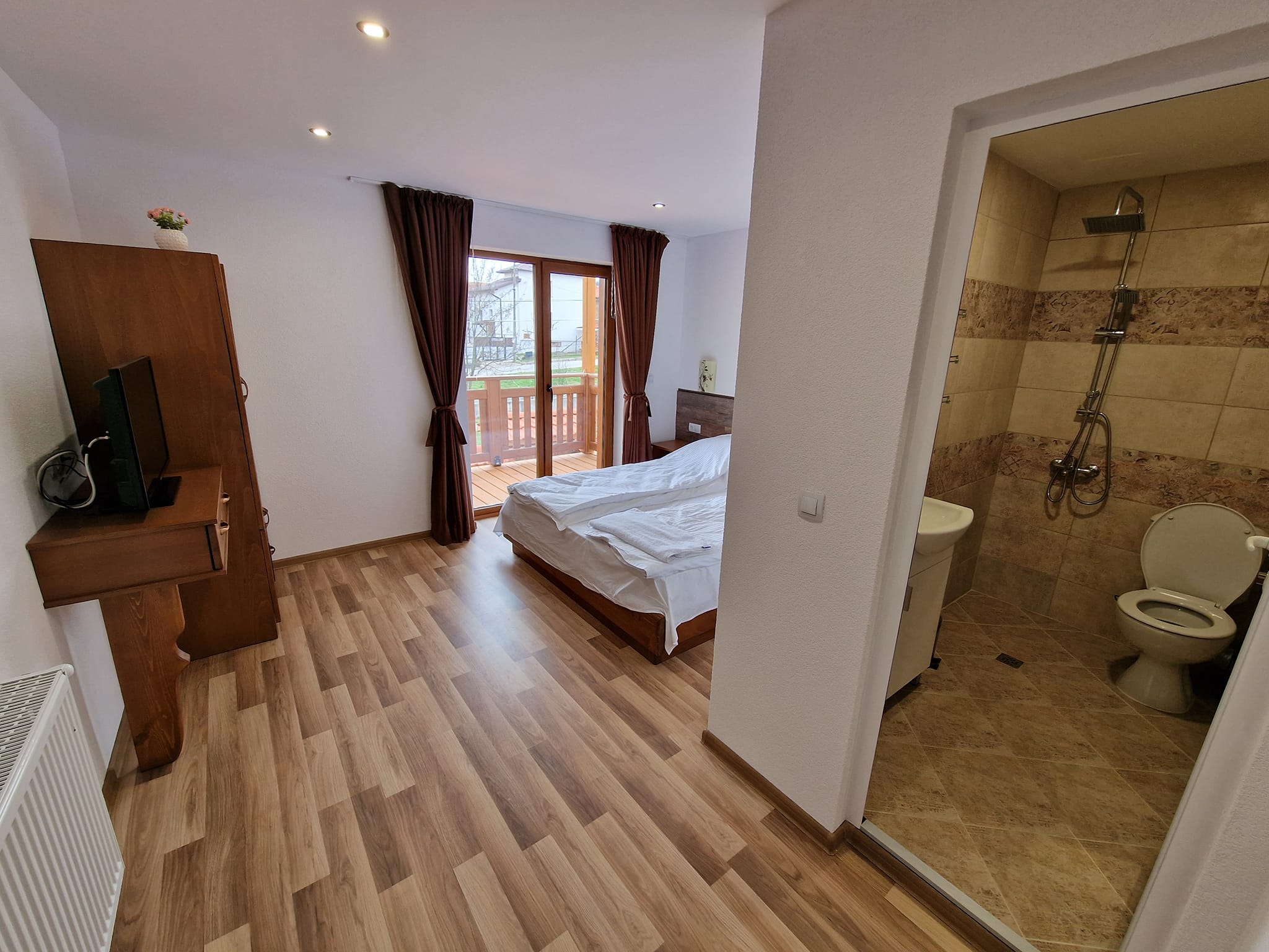 Renovated three-story house with a large yard for sale in the village of Banya, Bansko region