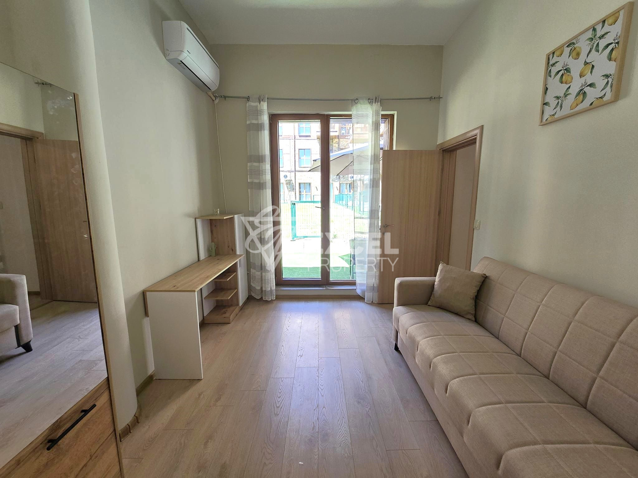 Two bedroom apartment with new furniture and low maintenance fee for sale in Bansko