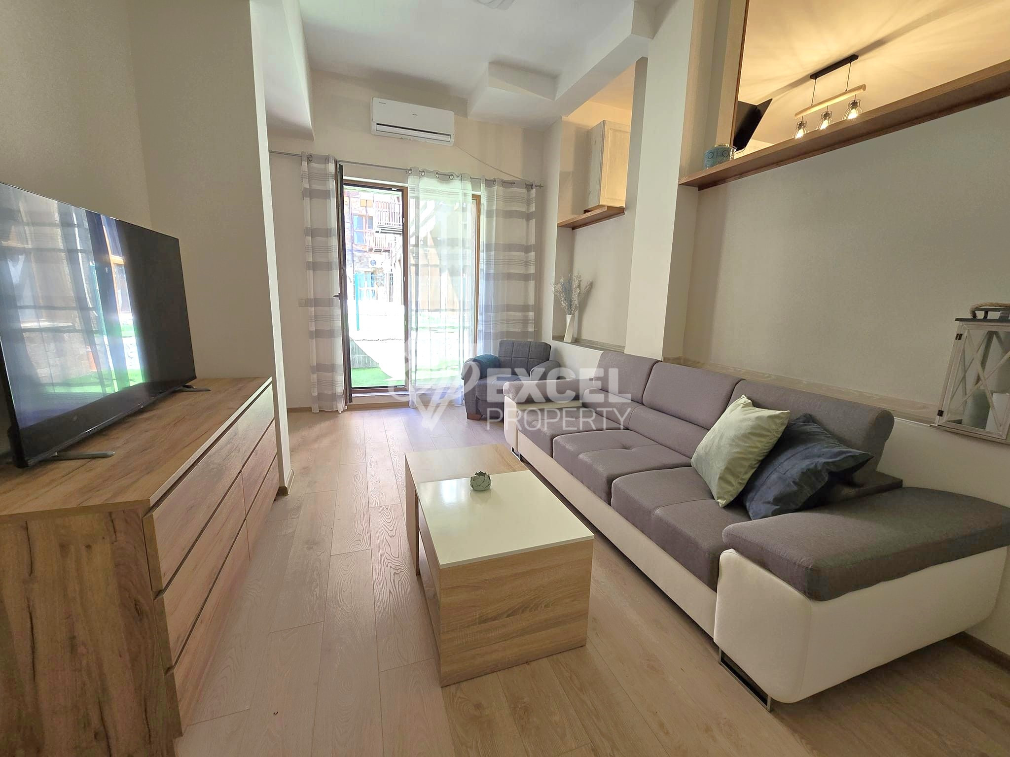 Two bedroom apartment with new furniture and low maintenance fee for sale in Bansko