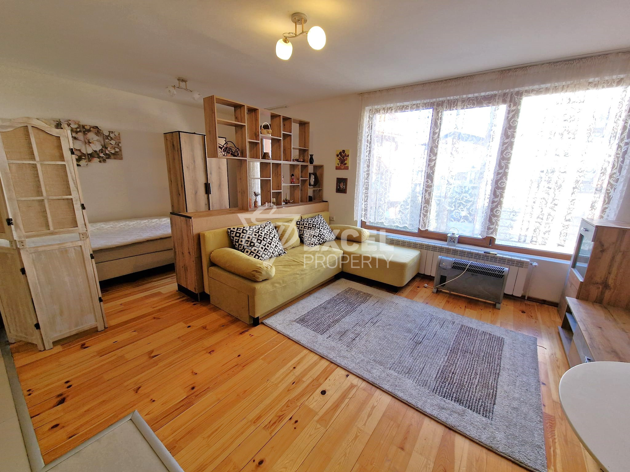 Affordable studio with east facing terrace in a building with low maintenance fee for sale in Bansko
