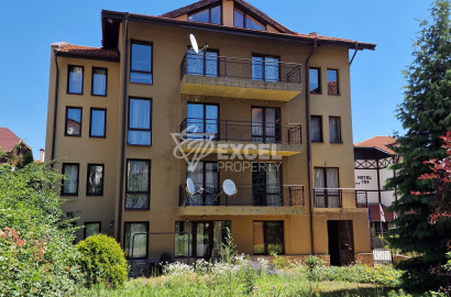 Three-room apartment with a fireplace and a low maintenance fee next to the Tane hotel in Bansko