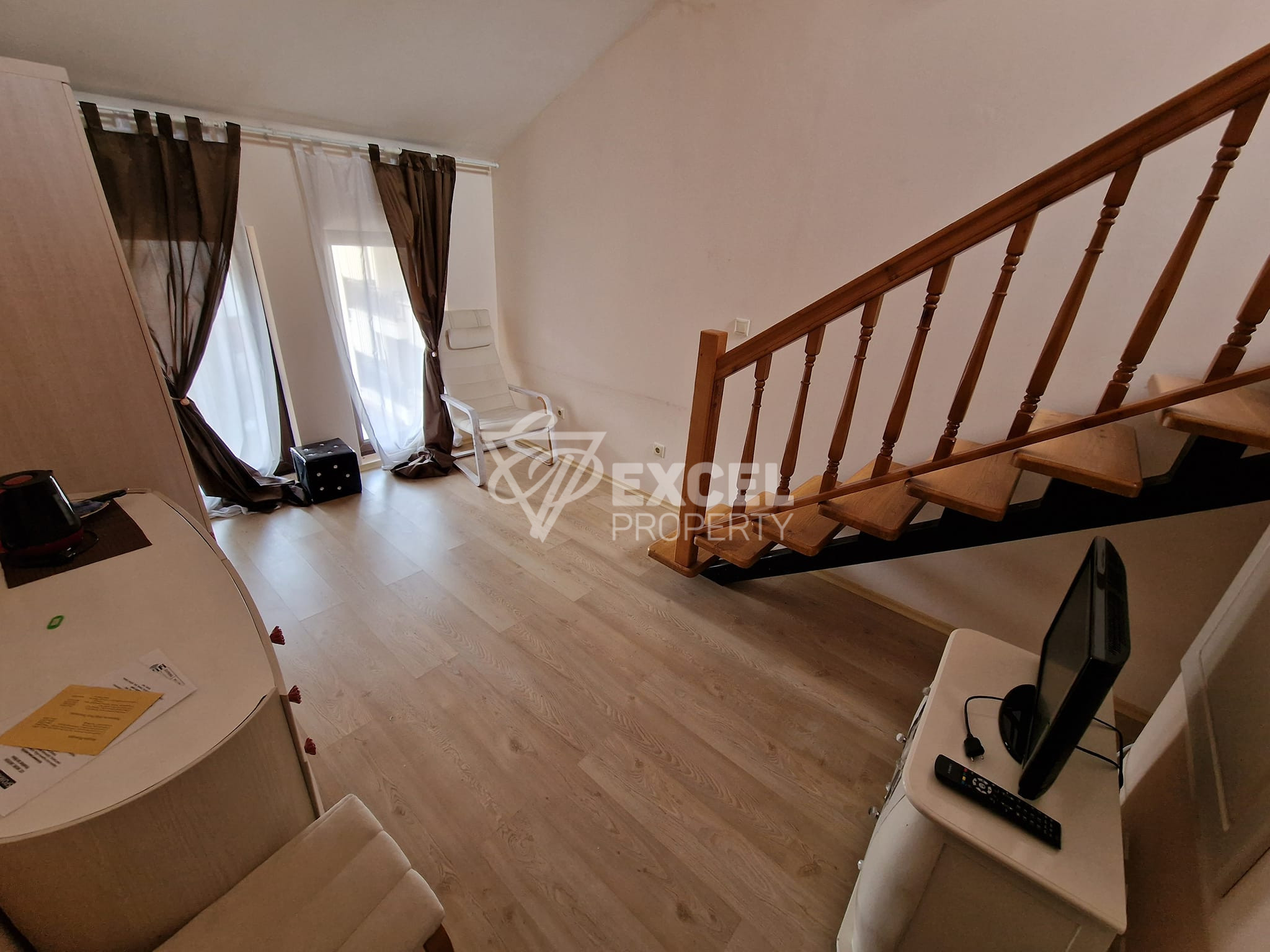 A maisonette apartment in a building with a low maintenance fee next to the Tane hotel, Bansko