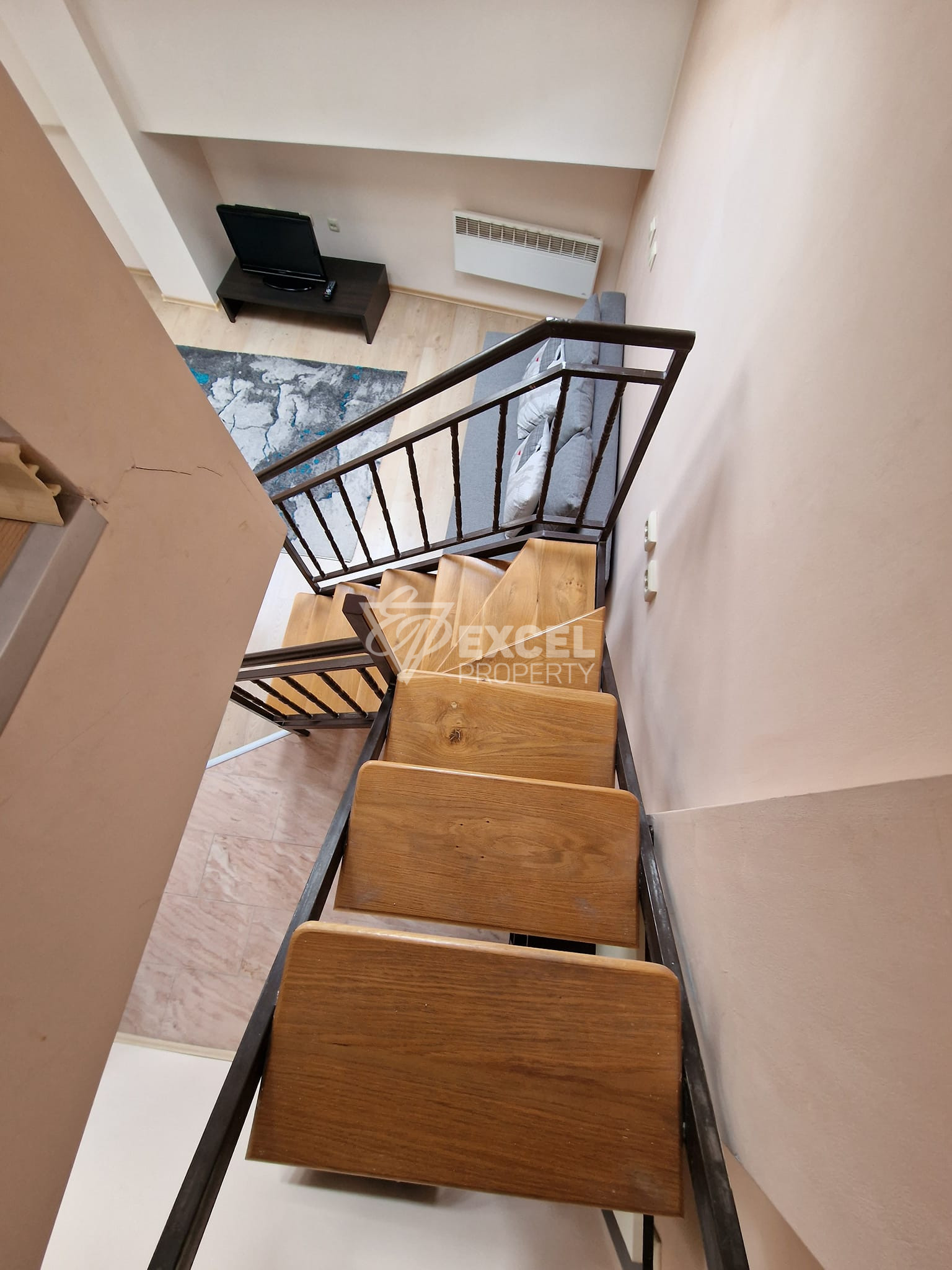 A maisonette apartment in a building with a low maintenance fee next to the Tane hotel