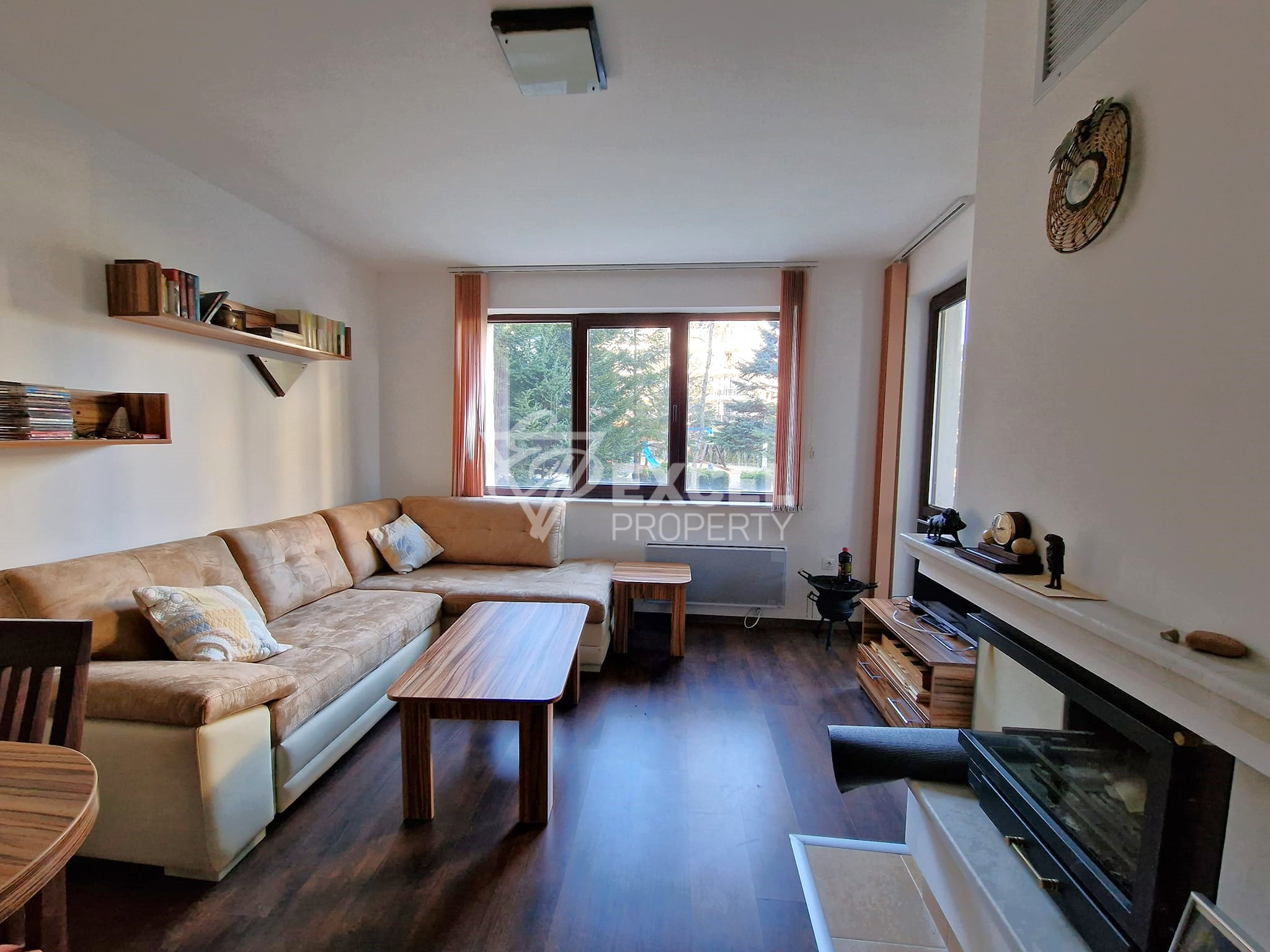 Exclusive two bedroom apartment with a fireplace at a bargain price for sale in Bansko