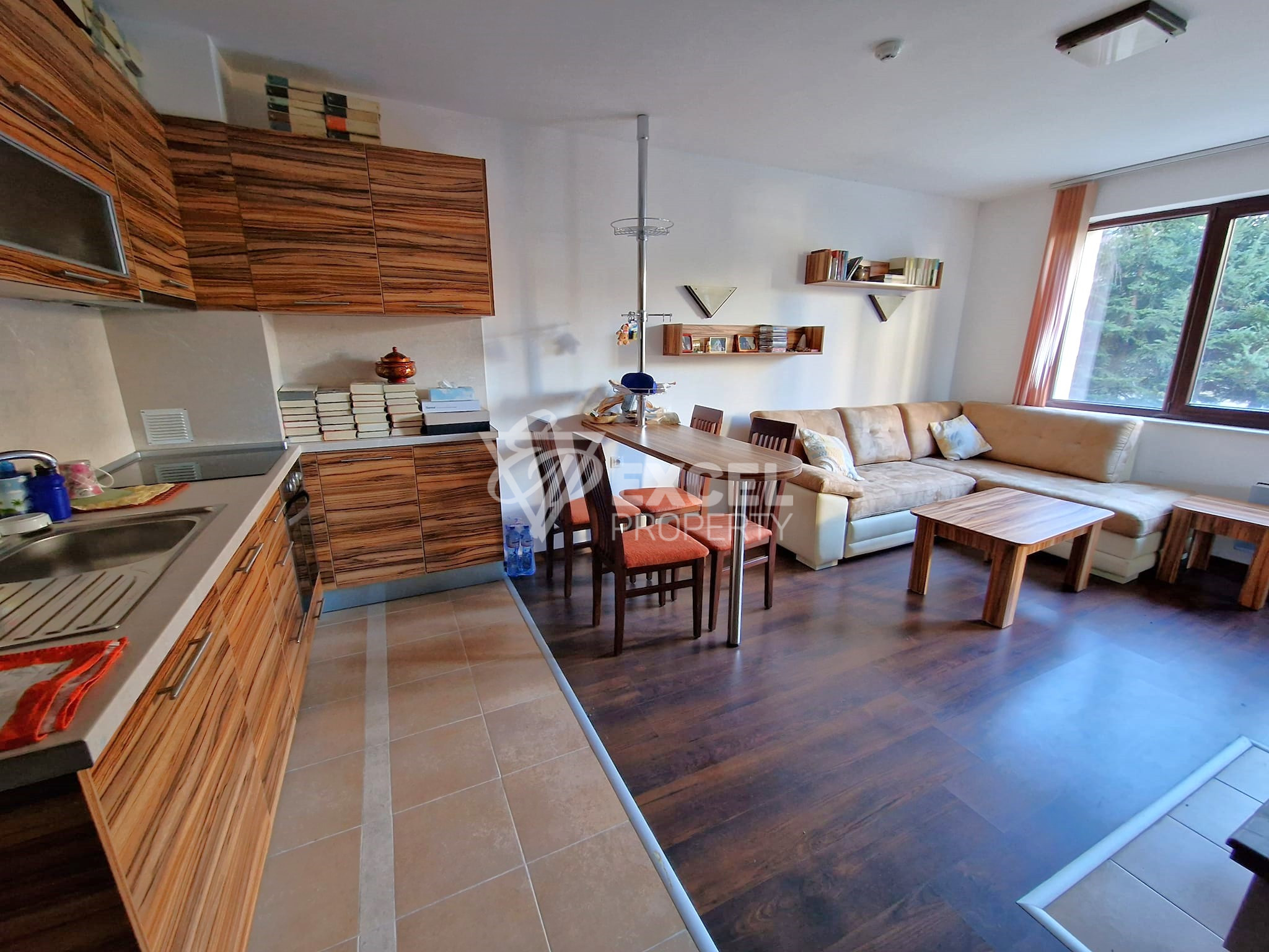 Exclusive two bedroom apartment with a fireplace at a bargain price for sale in Bansko
