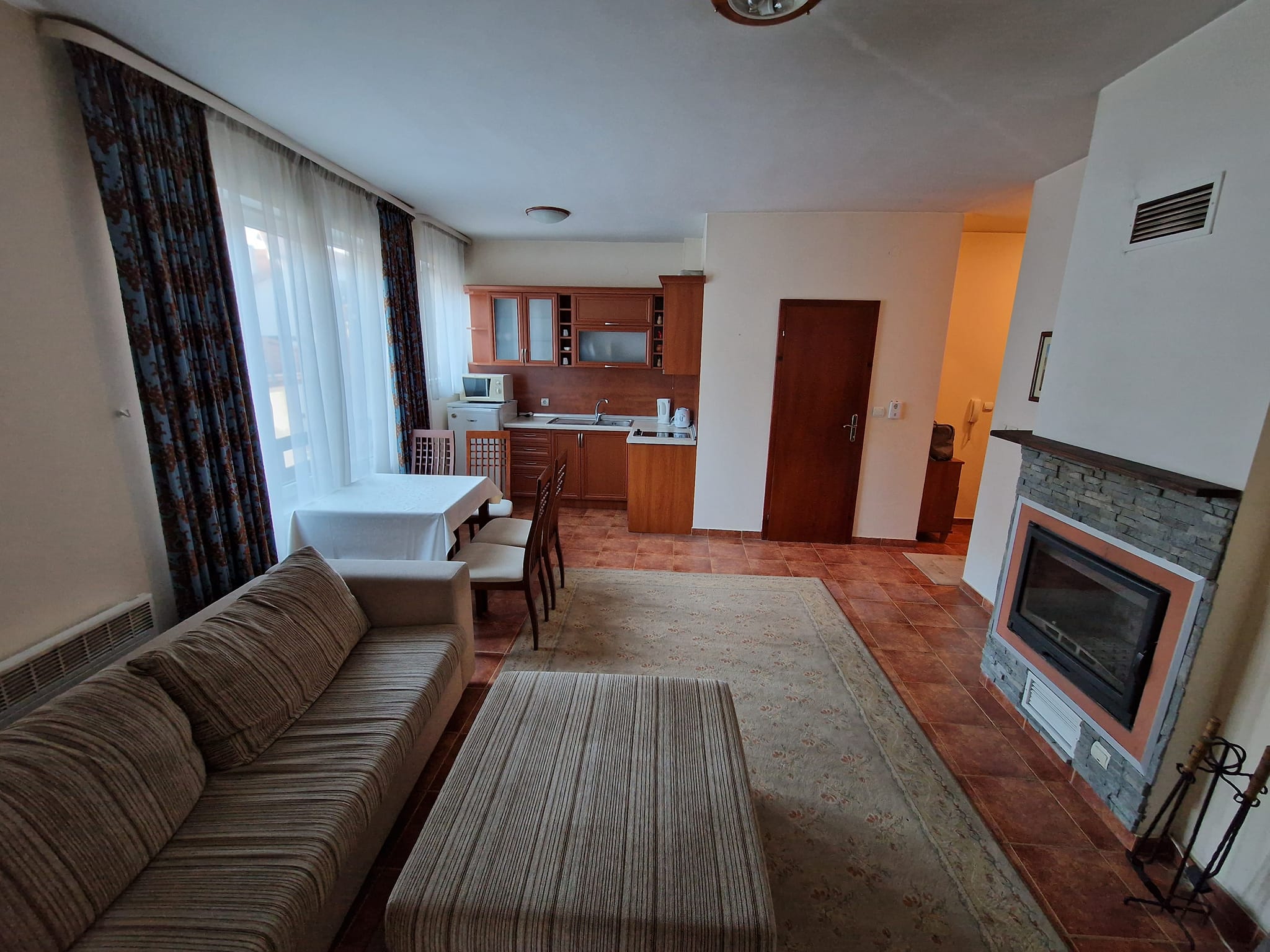 Sunny one bedroom apartment with fireplace for sale in Bansko next to Lucky Hotel