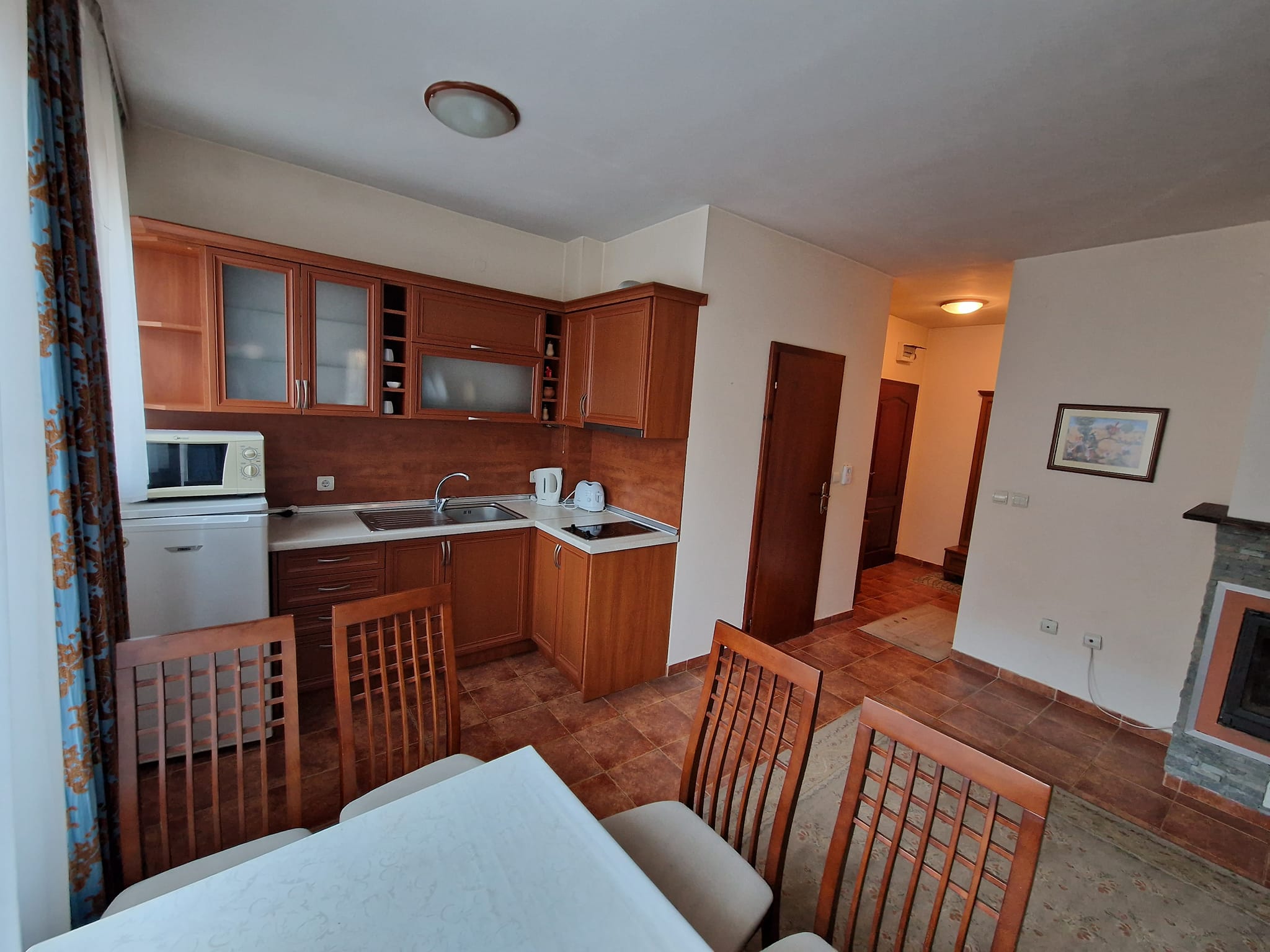 Sunny one bedroom apartment with fireplace for sale in Bansko next to Lucky Hotel