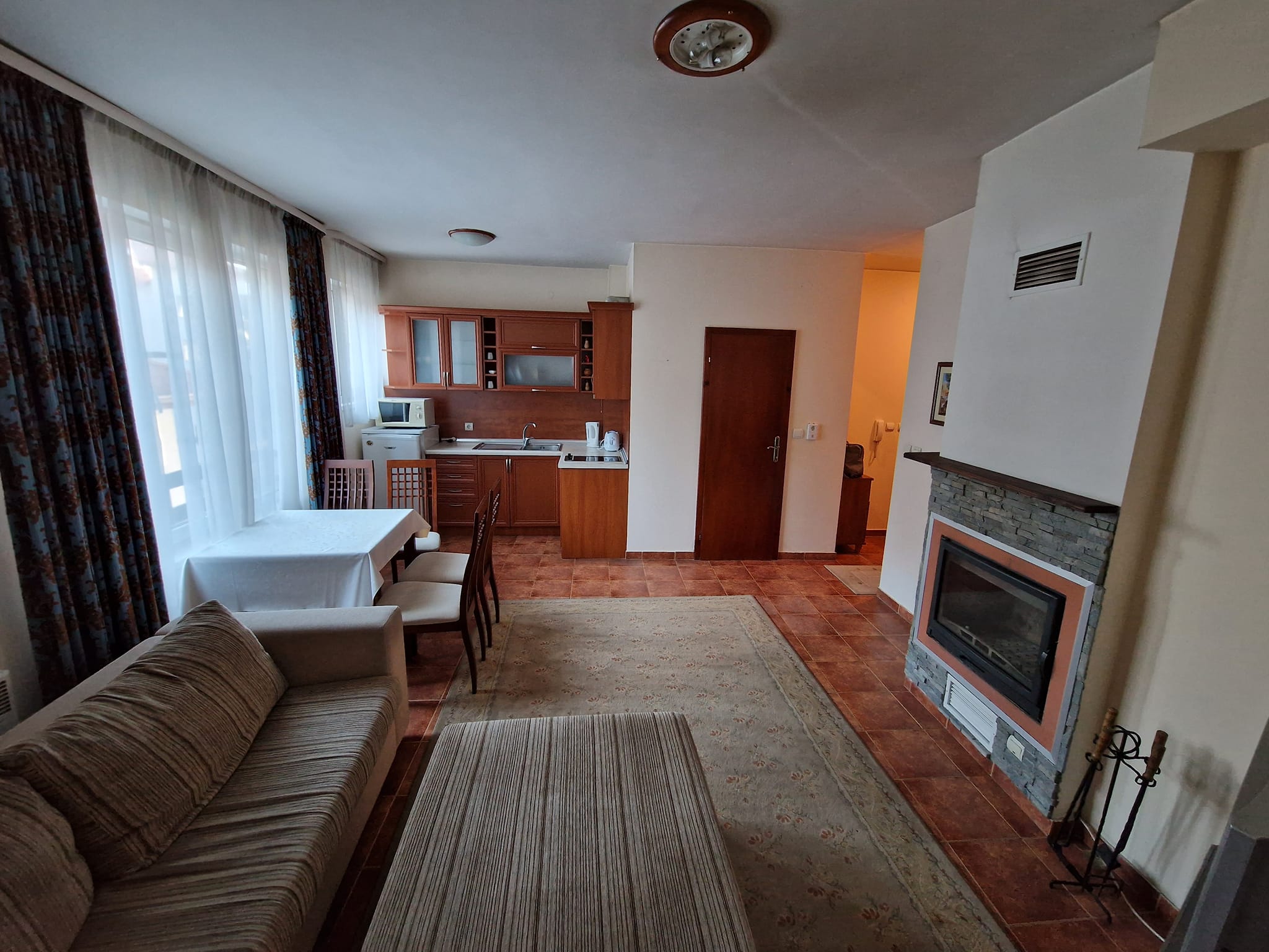 Sunny one bedroom apartment with fireplace for sale in Bansko next to Lucky Hotel