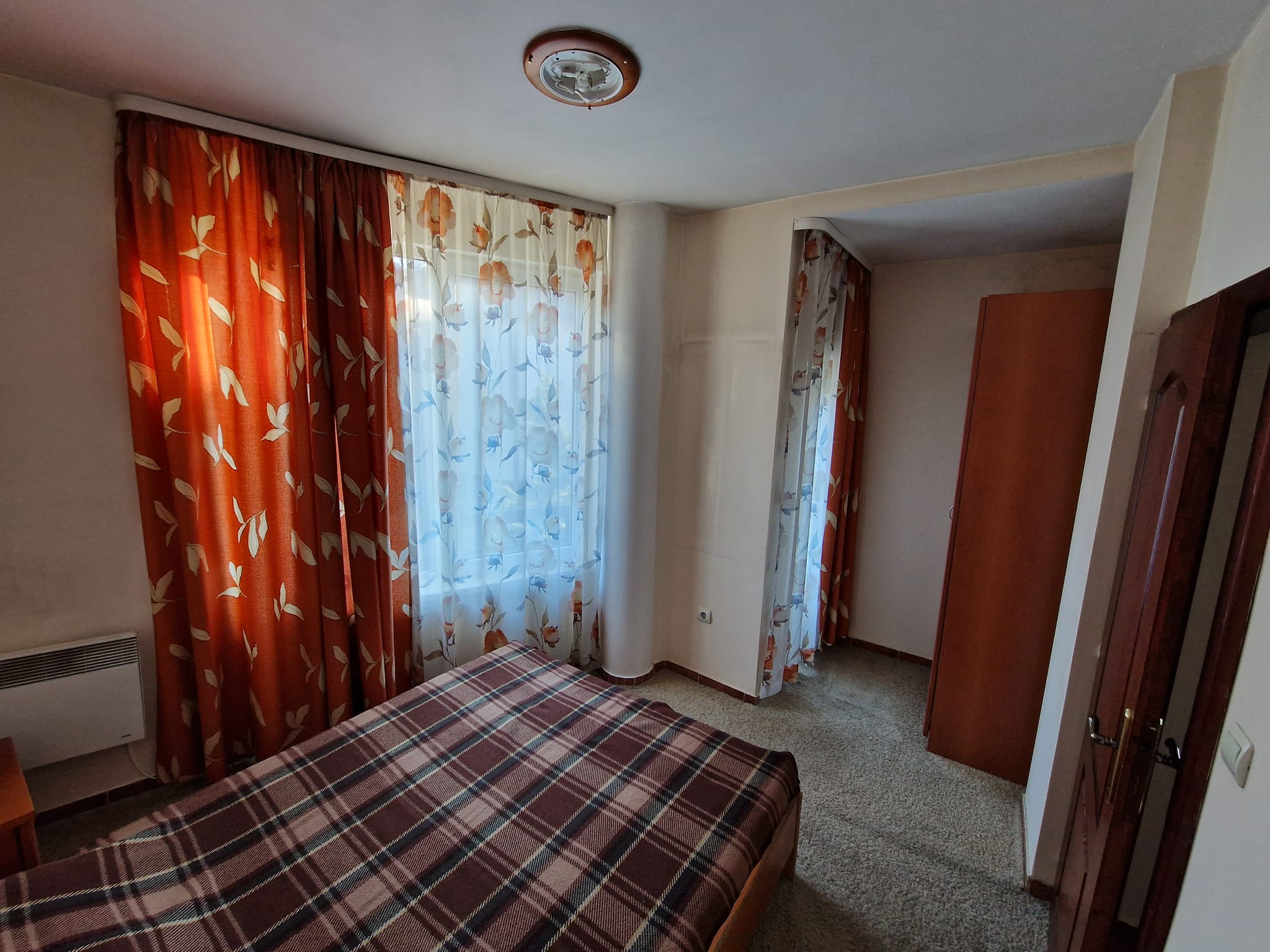 Sunny one bedroom apartment with fireplace for sale in Bansko next to Lucky Hotel