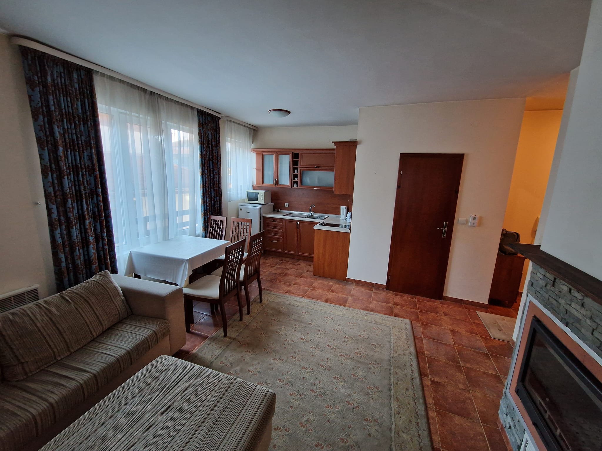 Sunny one bedroom apartment with fireplace for sale in Bansko next to Lucky Hotel