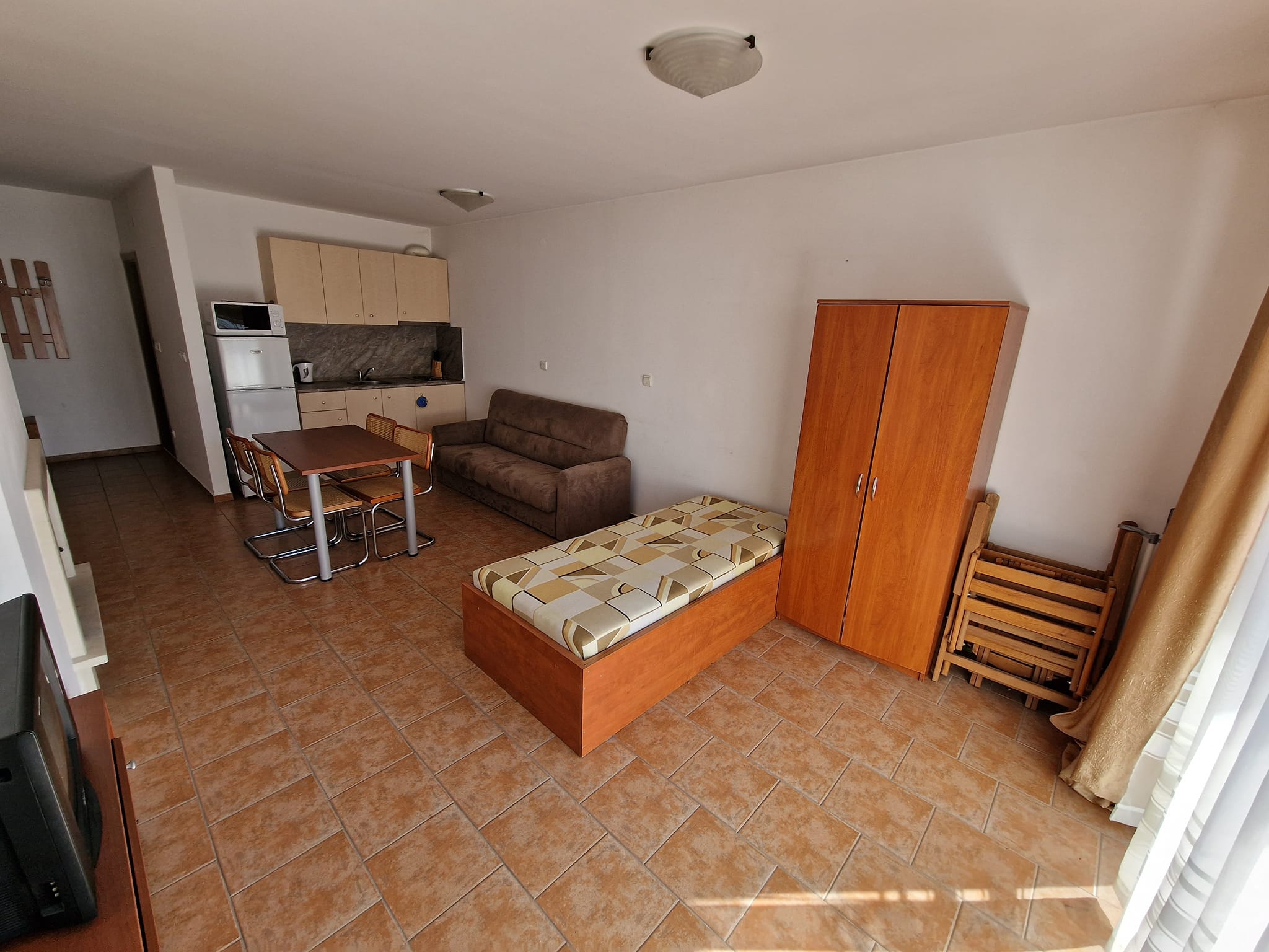 Southern, spacious studio with low maintenance fee for sale in Bansko