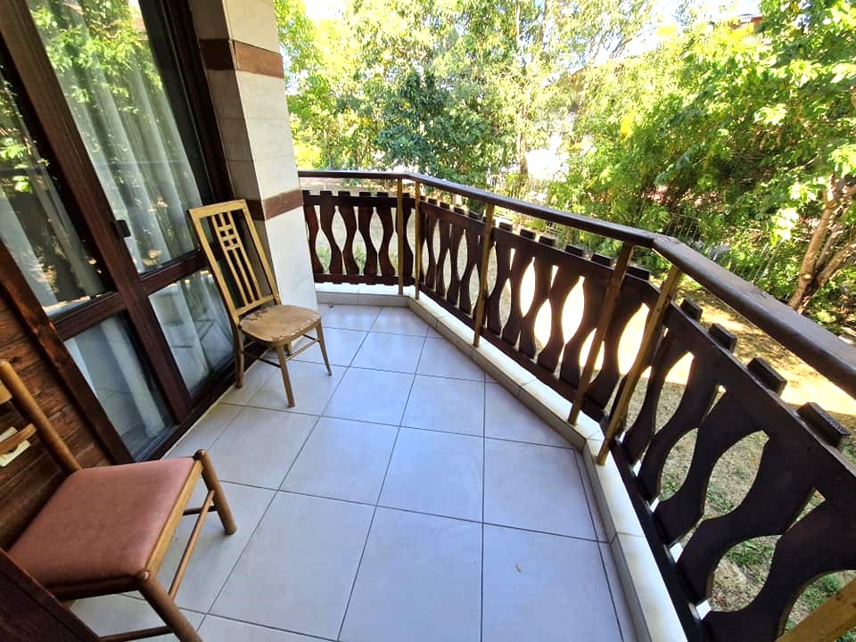 Furnished one bedroom apartment with a fireplace in a gated complex with a pool