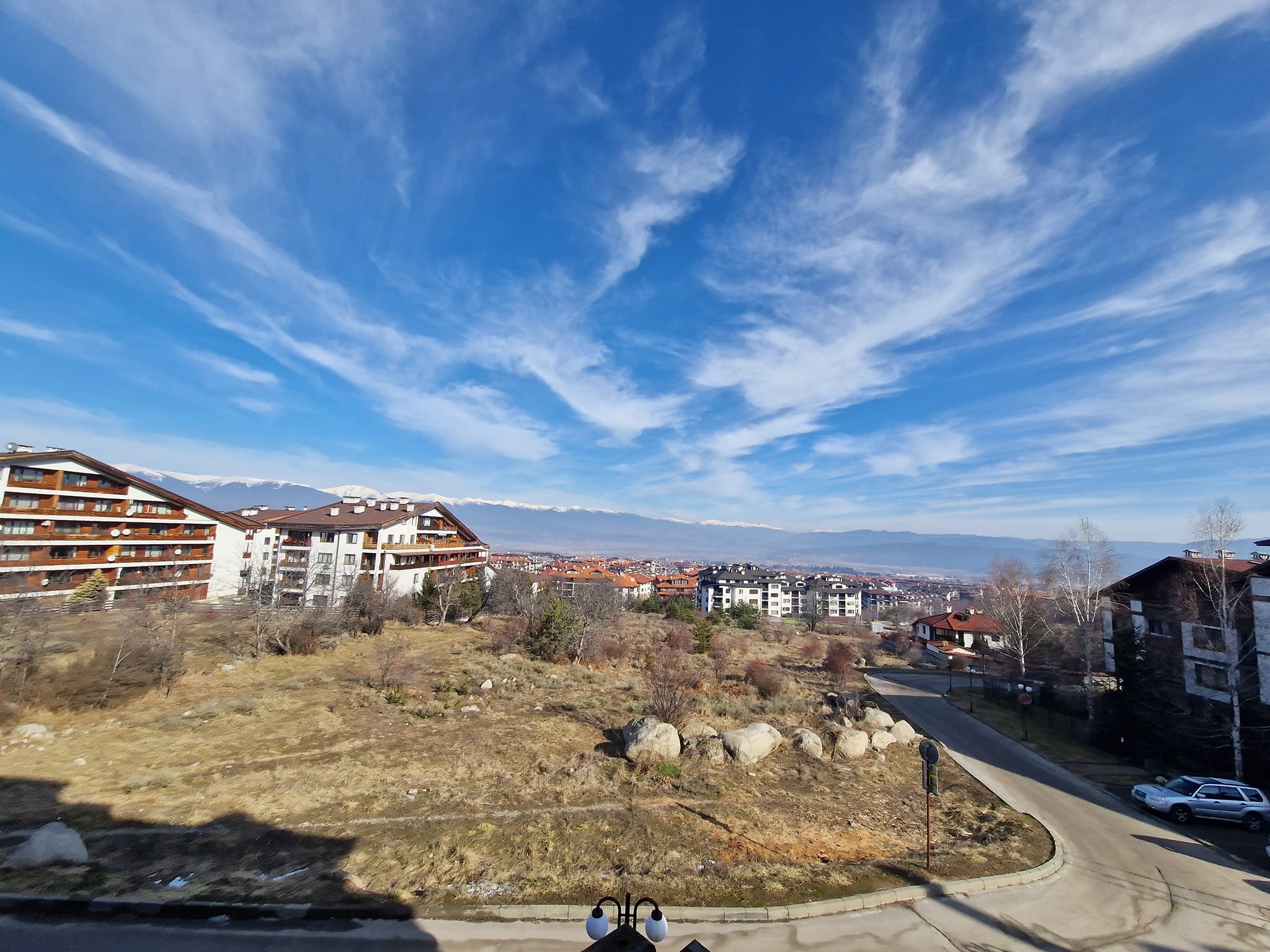 A unique three bedroom apartment with a stunning view of three mountains and the city of Bansko