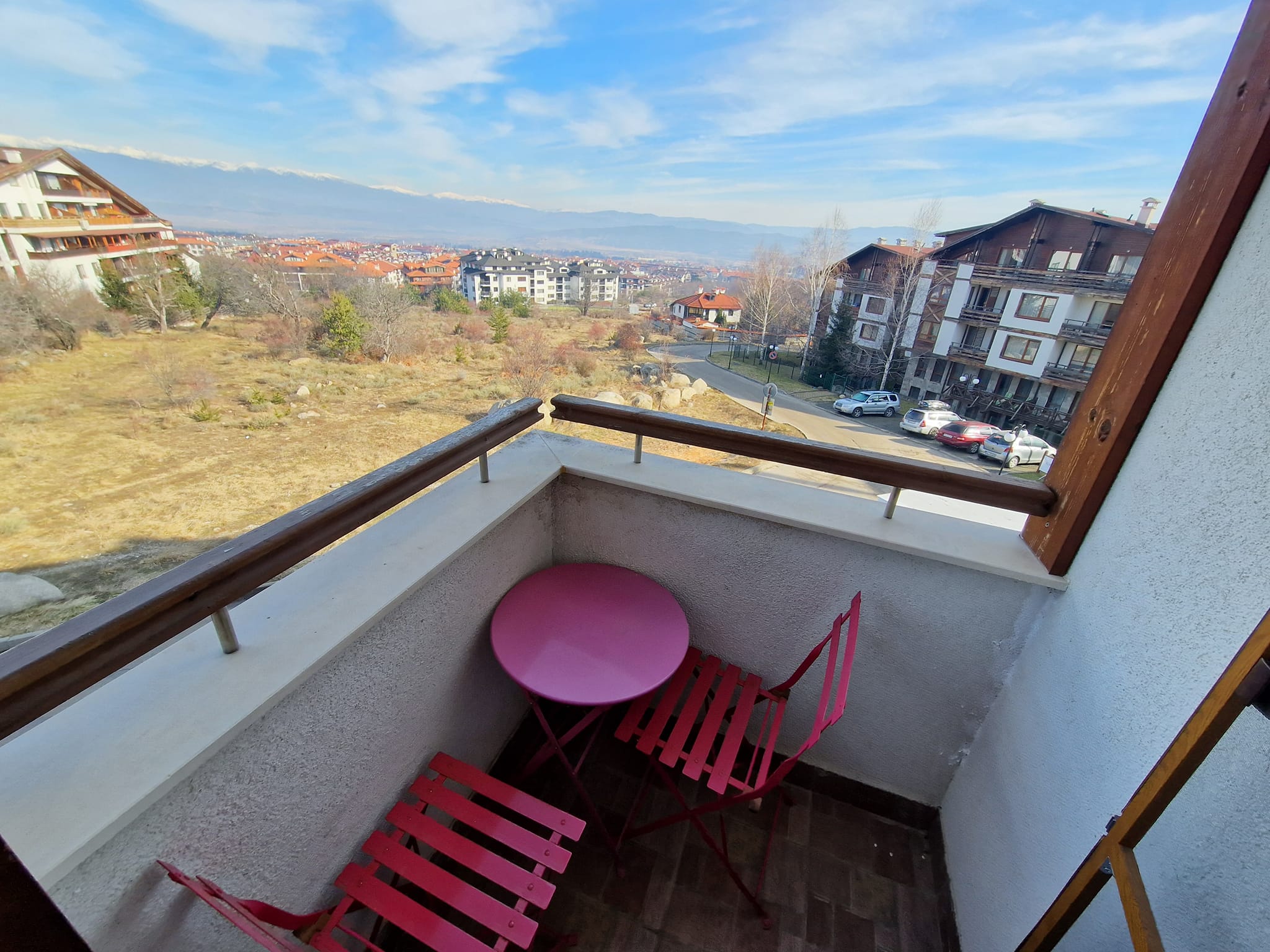 A unique three bedroom apartment with a stunning view of three mountains and the city of Bansko